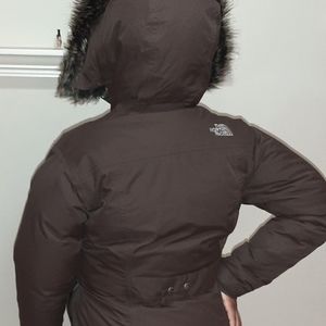 A Northface coat with a furry hood
